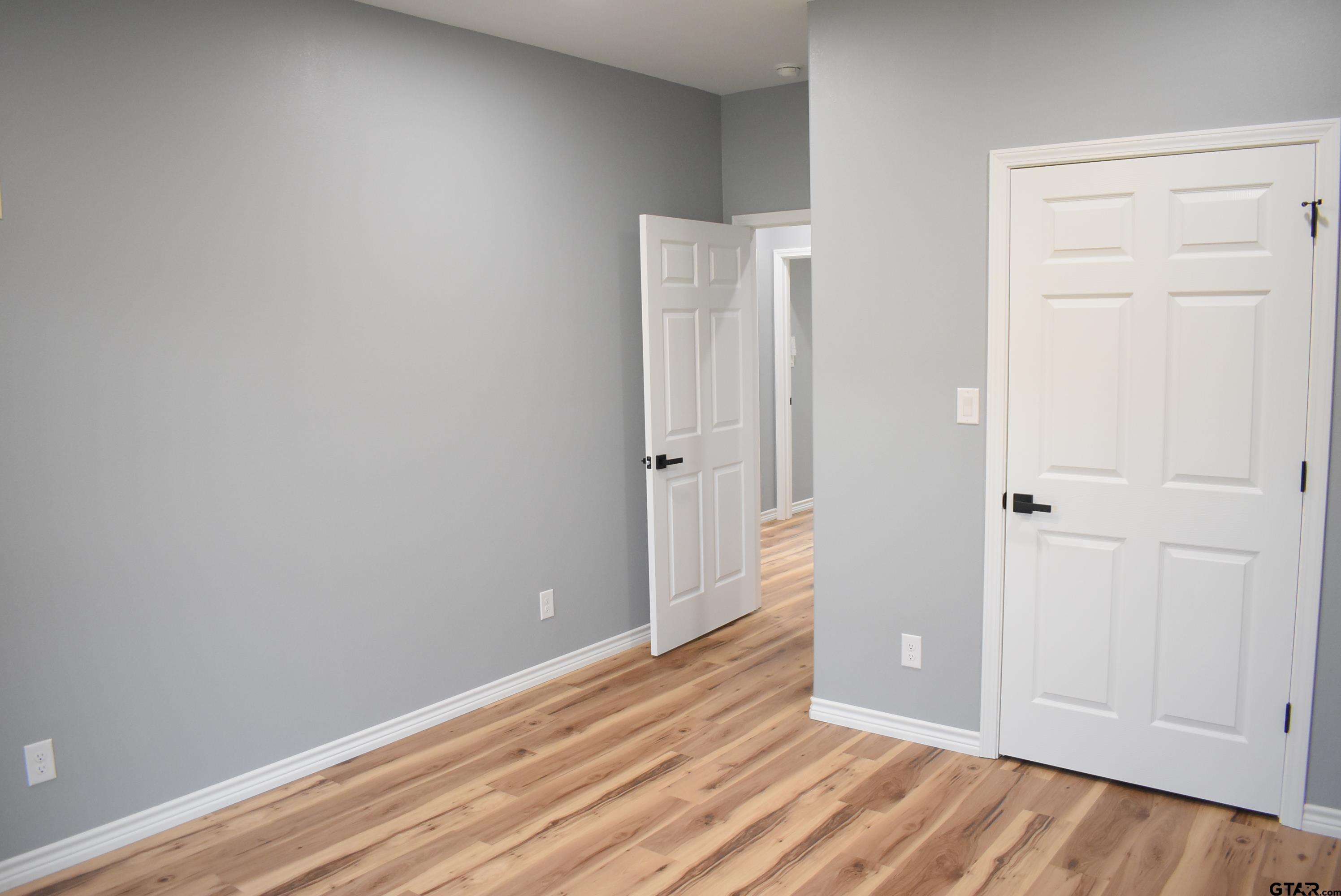 162 Ruby Lane Nacogdoches, TX 75965 - Photo 23 of 44 a view of an empty room with wooden floor