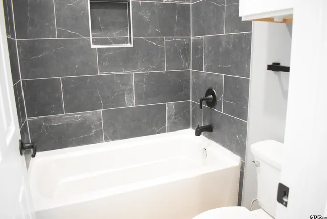 a bathroom with a bathtub