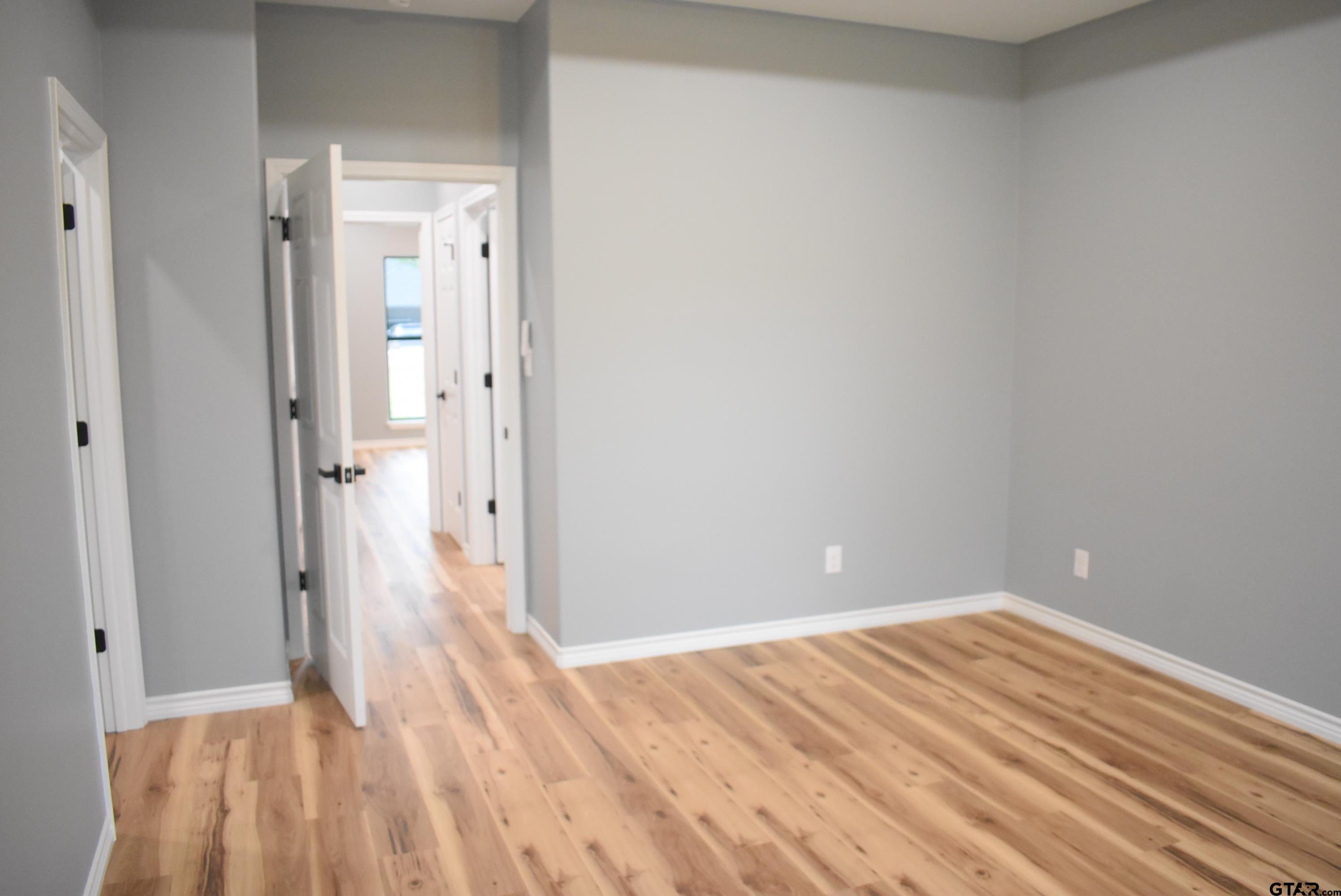 162 Ruby Lane Nacogdoches, TX 75965 - Photo 33 of 44 a view of a room with wooden floor and bathroom