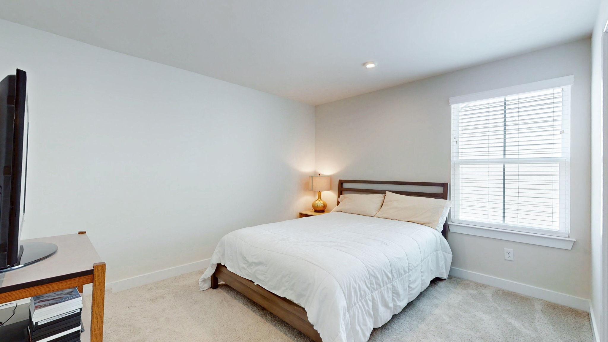 1547 Repton Road Smyrna, TN 37167 - Photo 21 of 47 a bed sitting in a bedroom next to a window