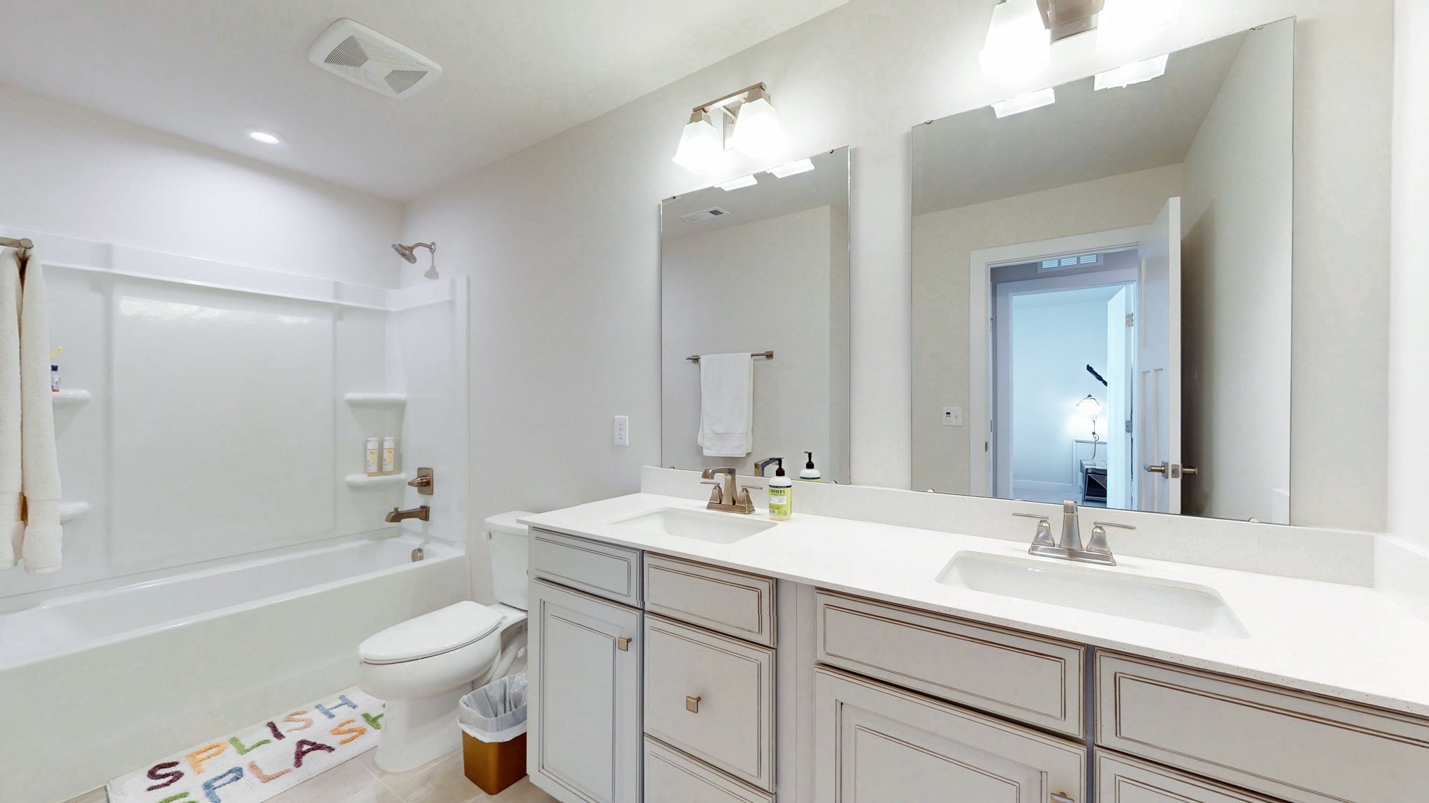 1547 Repton Road Smyrna, TN 37167 - Photo 23 of 47 a bathroom with a sink a toilet a large mirror and shower