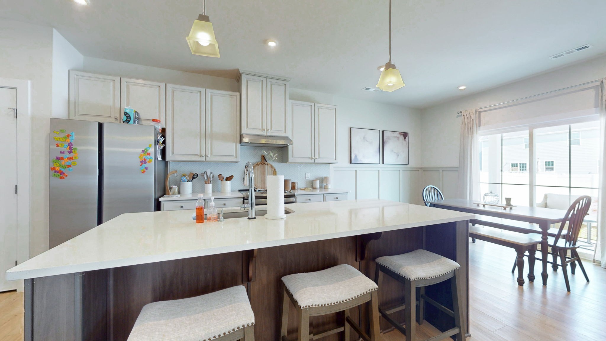 1547 Repton Road Smyrna, TN 37167 - Photo 3 of 47 a kitchen with stainless steel appliances a dining table chairs and refrigerator