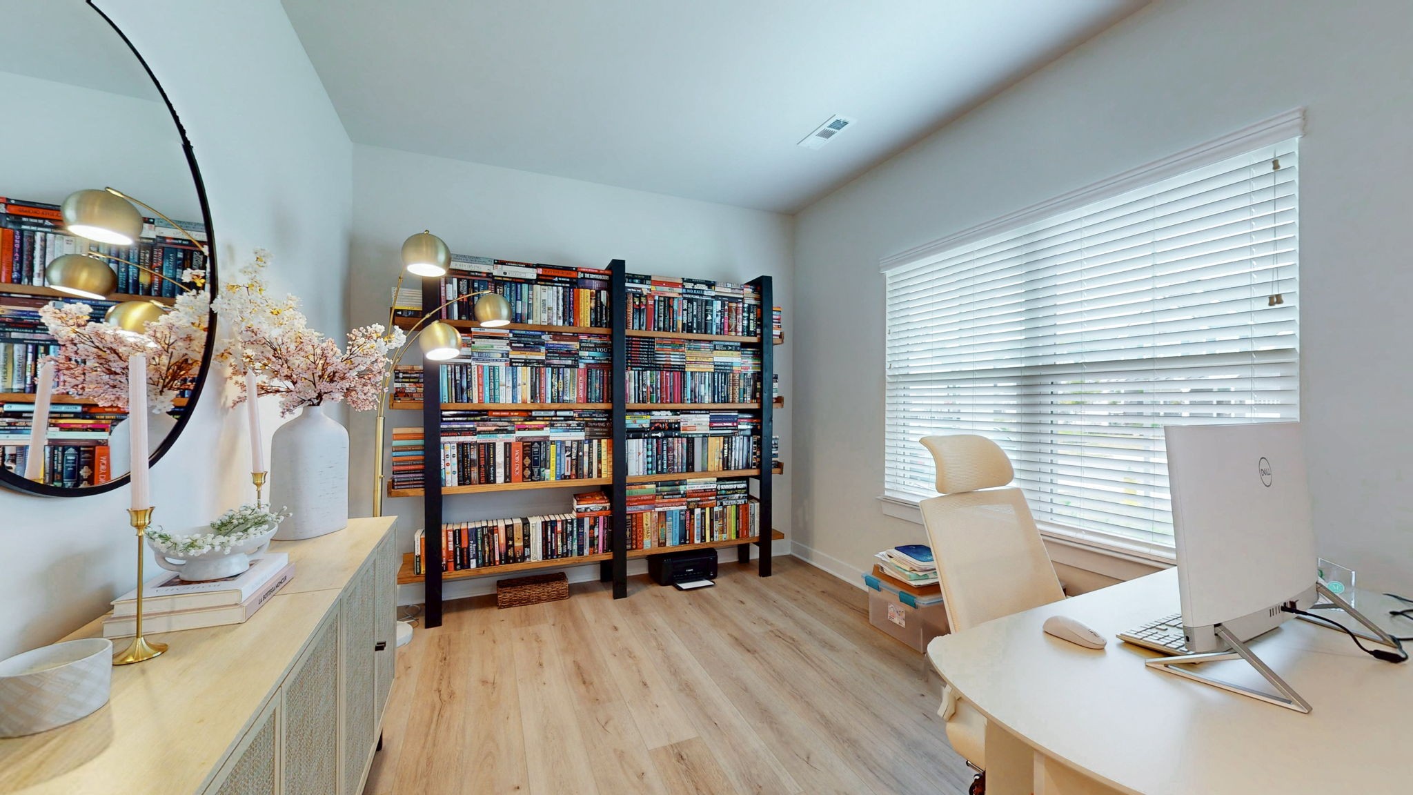 1547 Repton Road Smyrna, TN 37167 - Photo 6 of 47 a view of a workspace with furniture and a bookshelf