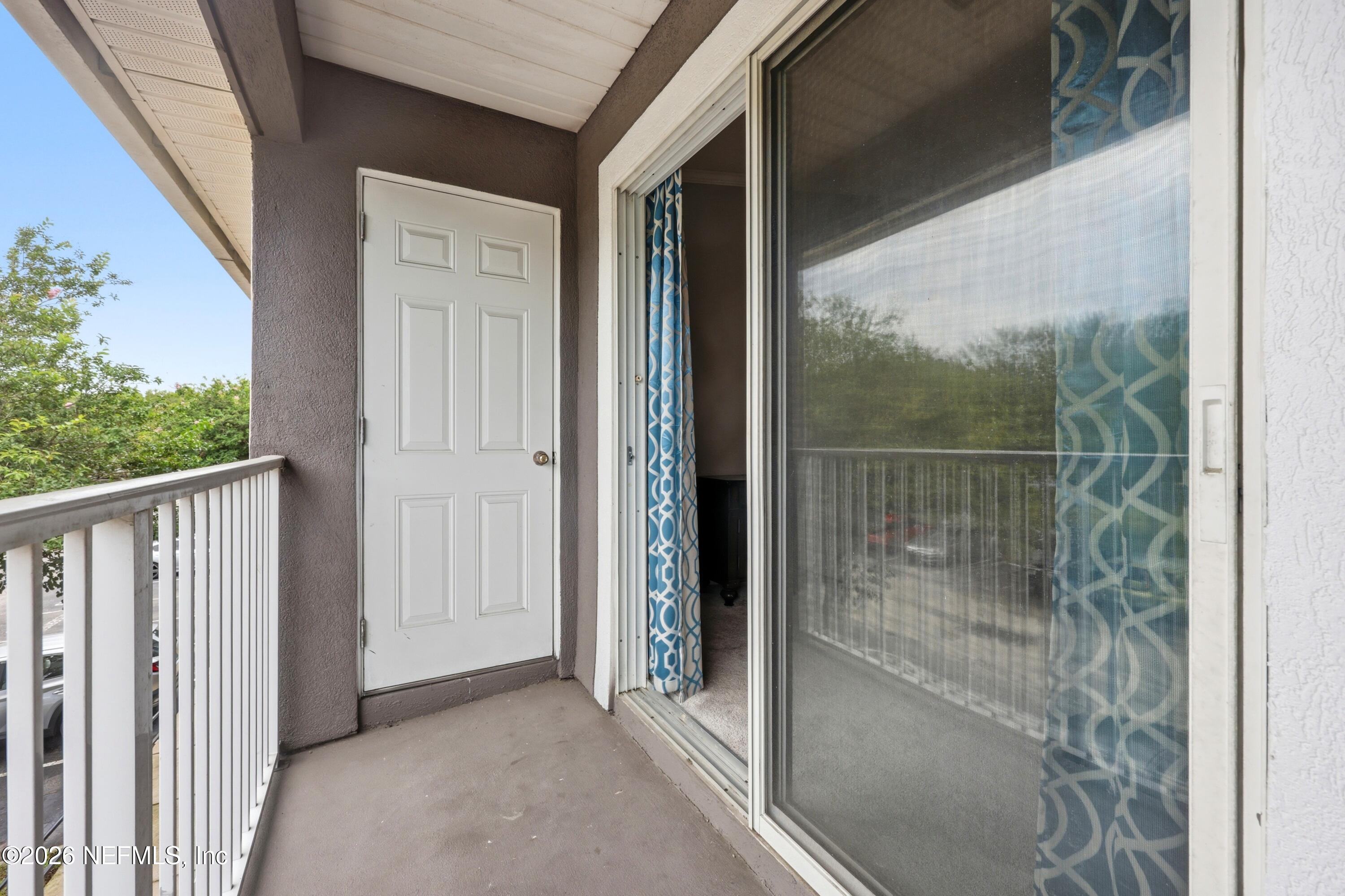 7920 Merrill Road, Unit 411 Jacksonville, FL 32277 - Photo 25 of 36 Balcony with Storage