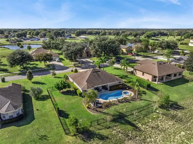 an aerial view of a house with a garden