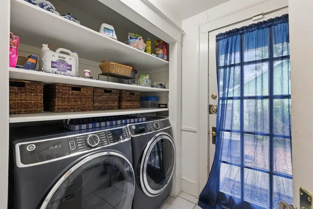 a close view of utility room with washer and dryer
