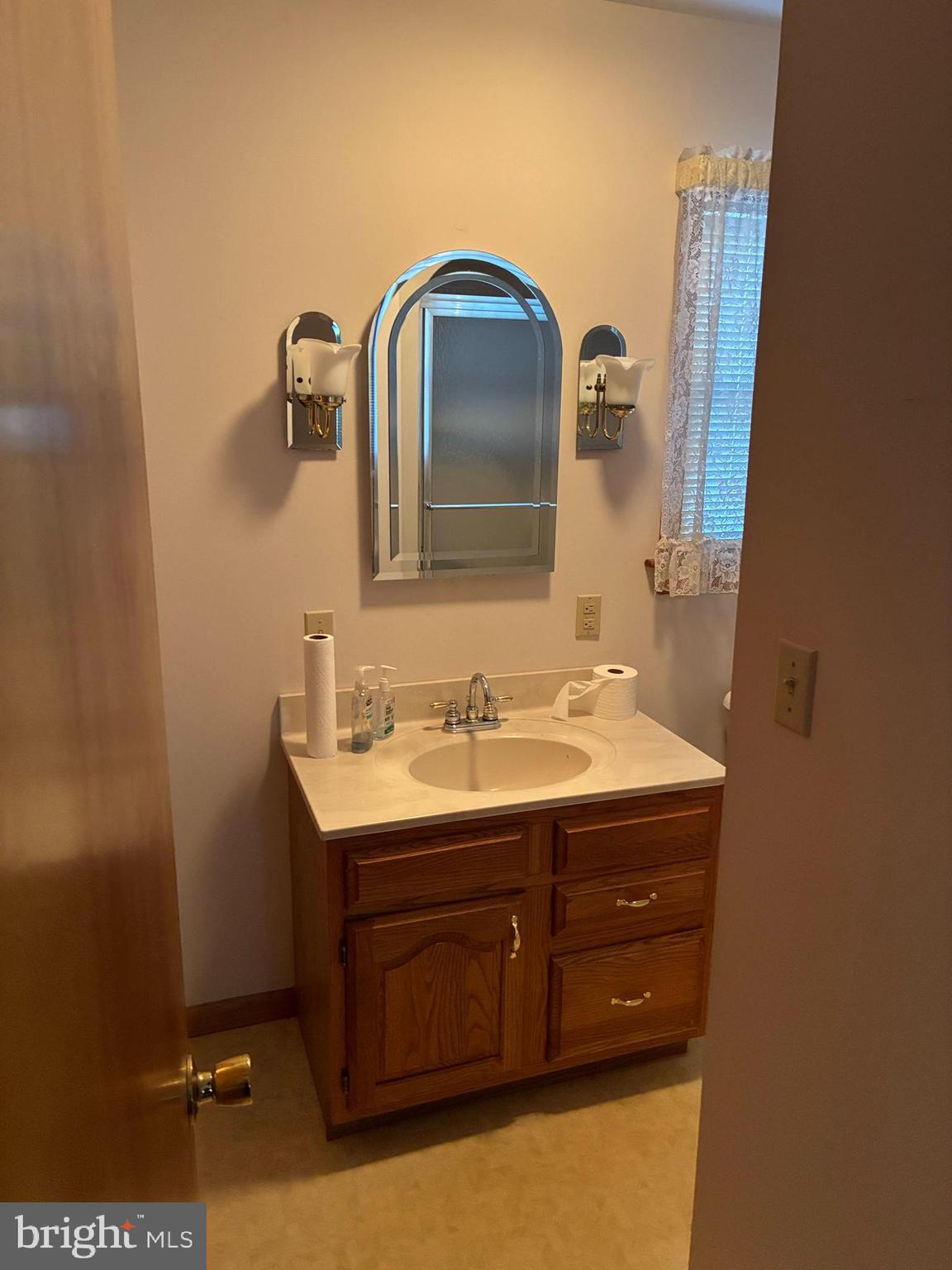 11 West Highland Avenue Enola, PA 17025 - Photo 17 of 67 a bathroom with a sink and a mirror