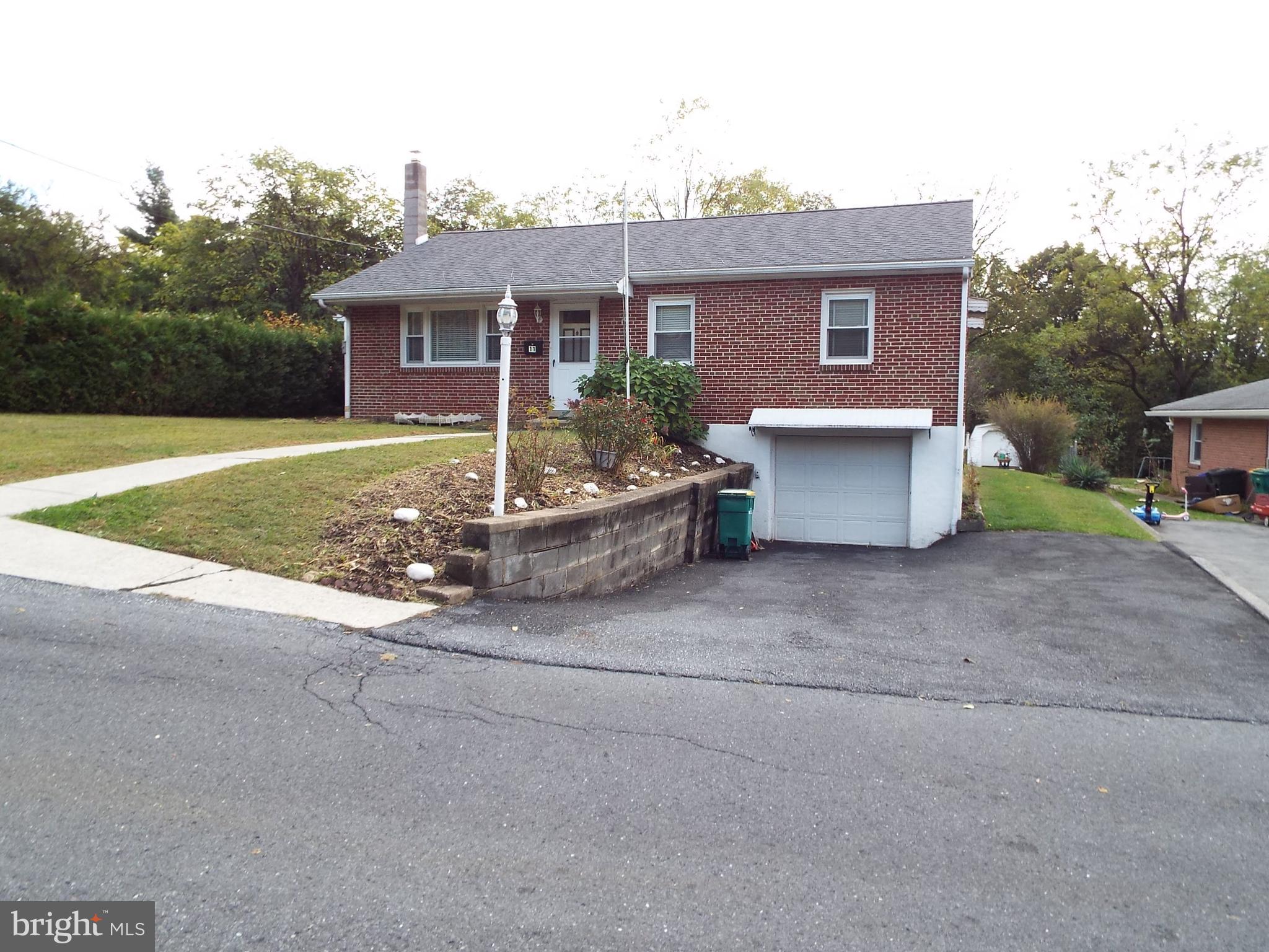 11 West Highland Avenue Enola, PA 17025 - Photo 3 of 67 a view of a house with backyard and garden