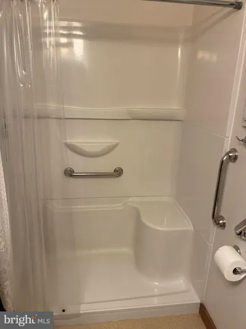 a view of parking garage with furniture