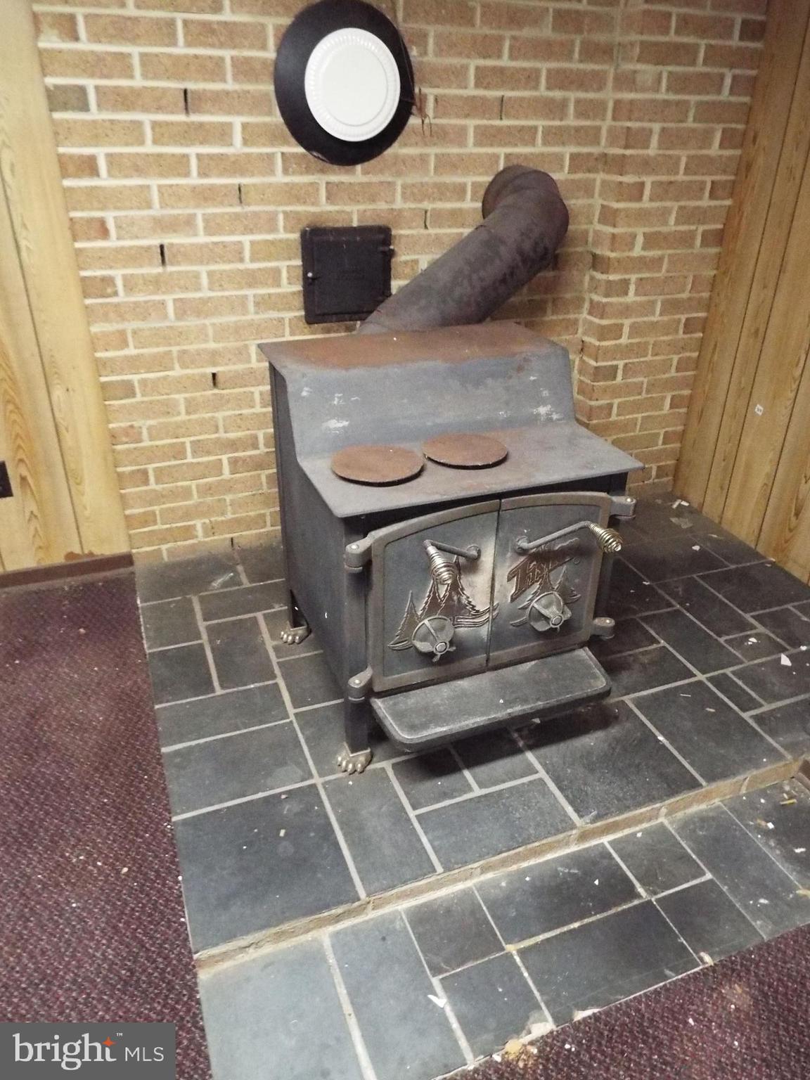 11 West Highland Avenue Enola, PA 17025 - Photo 39 of 67 a view of a brick wall with water heater and a sink