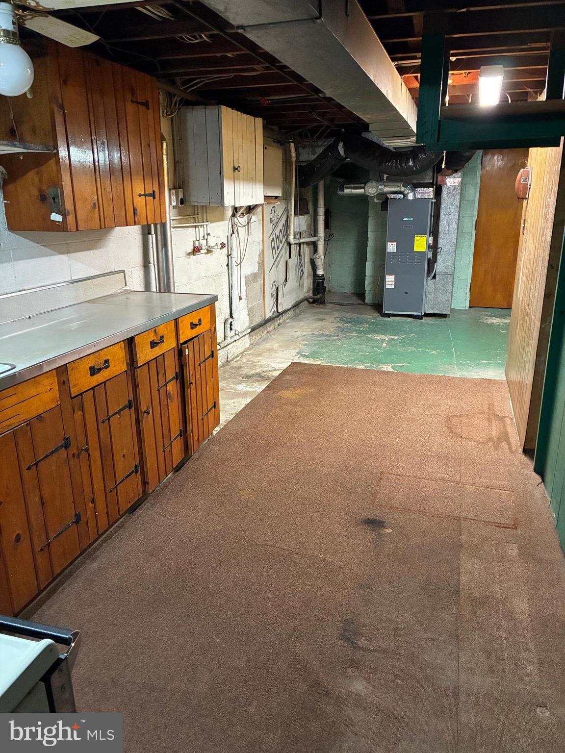 11 West Highland Avenue Enola, PA 17025 - Photo 48 of 67 a view of an empty room with wooden floor and windows