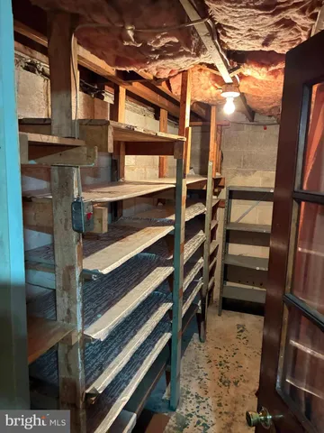 a view of a house with a yard and garage