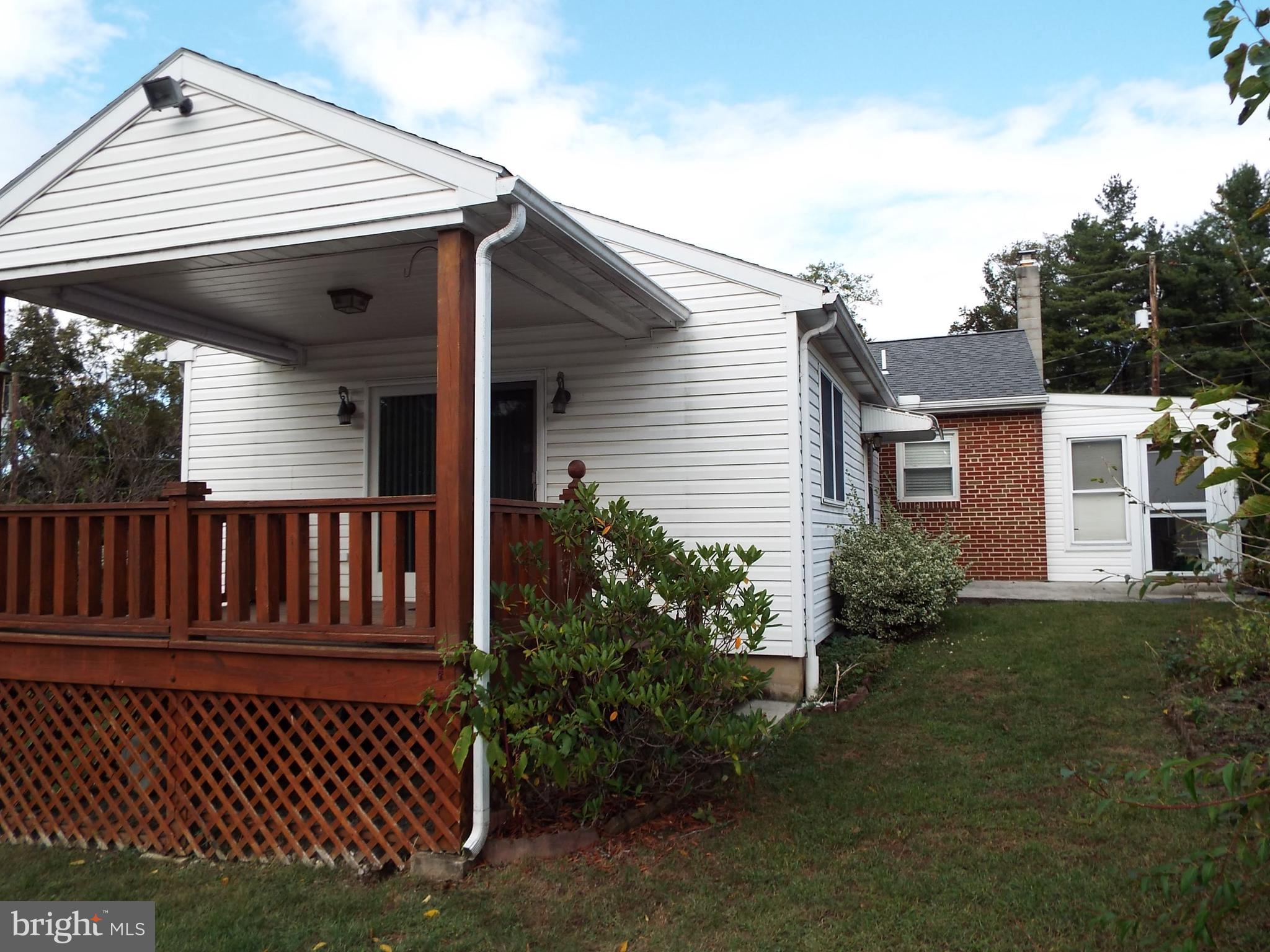 11 West Highland Avenue Enola, PA 17025 - Photo 64 of 67 a view of a house with a small yard and wooden fence