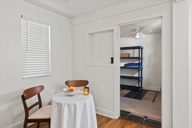 a room that has a bed and a chair in it