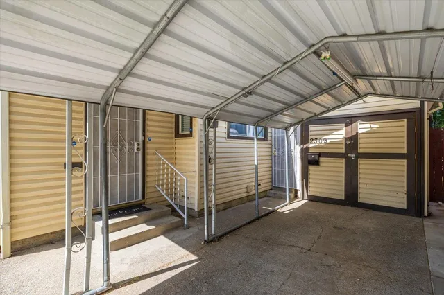 a view of a room with wooden walls
