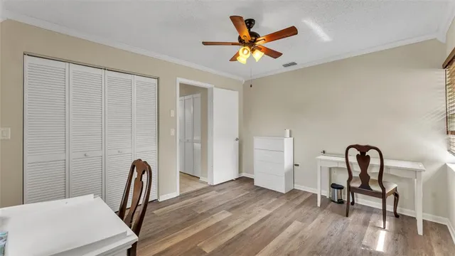a view of a livingroom with furniture and wooden floor