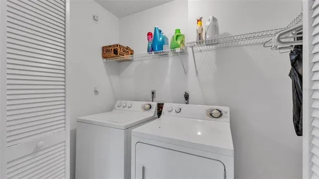 a utility room with dryer and washer