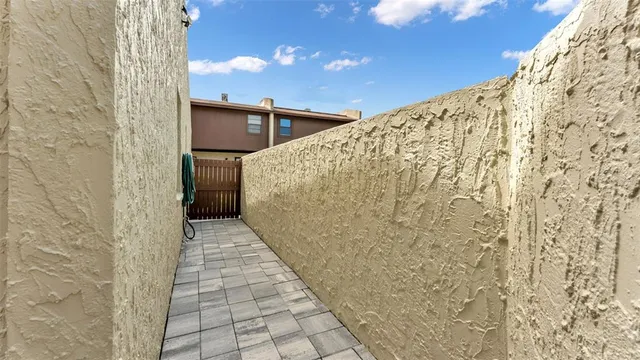 a view of a pathway along the wall