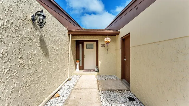 a view of a hallway with entryway