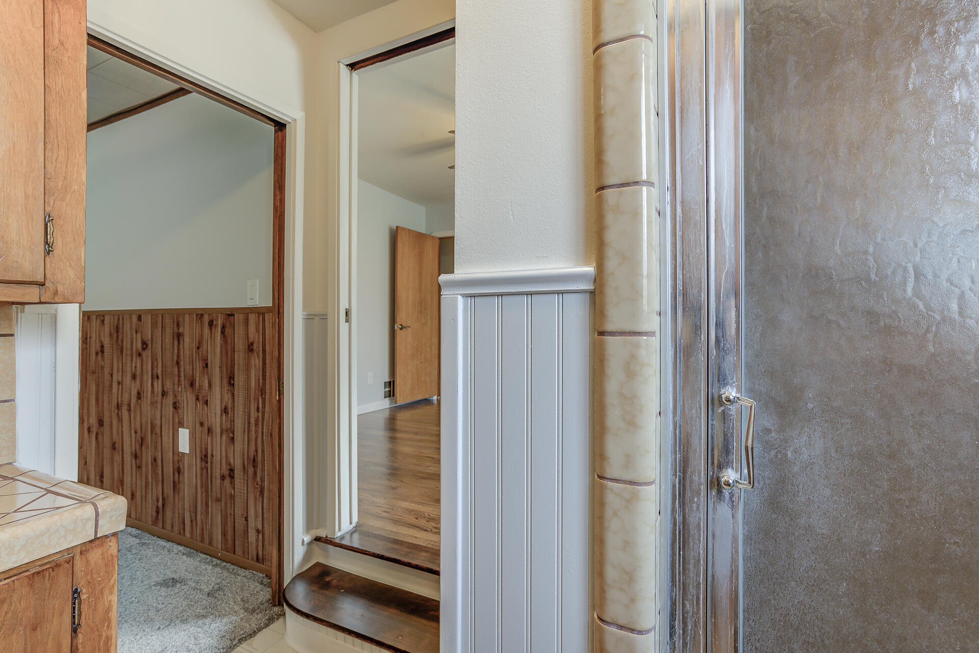 1445 Miller Way Red Bluff, CA 96080 - Photo 24 of 34 a bathroom with a glass shower door and a glass door