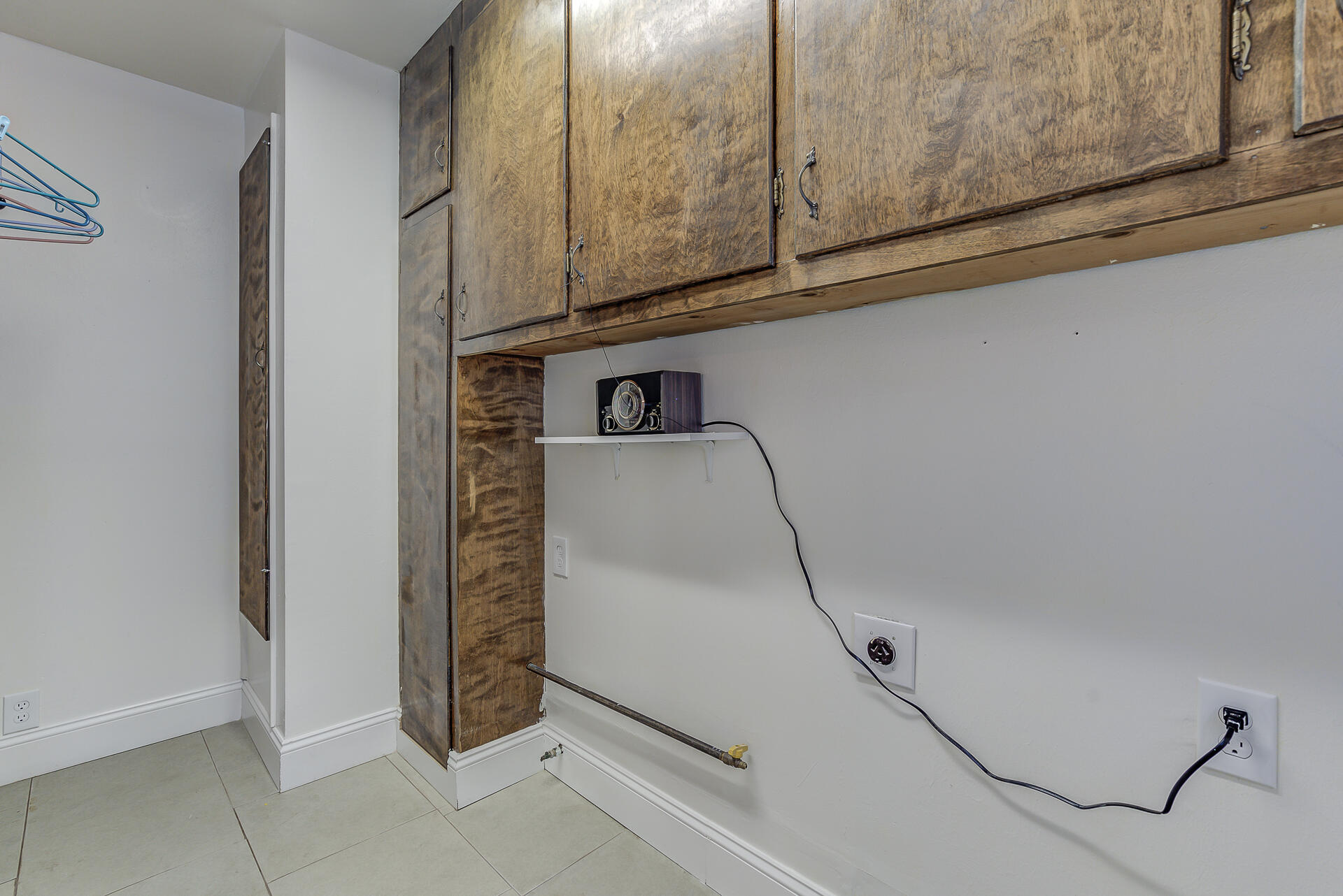 1445 Miller Way Red Bluff, CA 96080 - Photo 26 of 34 a utility room with cabinets
