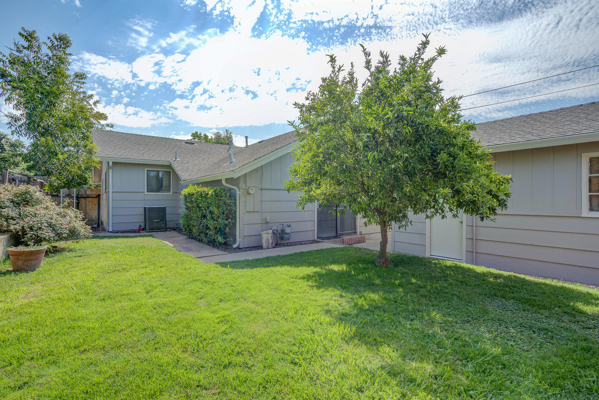 1445 Miller Way Red Bluff, CA 96080 - Photo 28 of 34 a view of a house with a yard