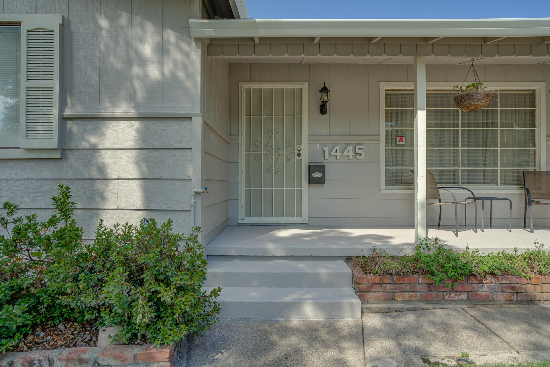 1445 Miller Way Red Bluff, CA 96080 - Photo 3 of 34 a front view of a house with a yard