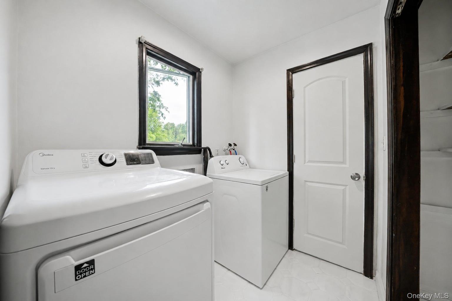 25 Hill Road Middletown, NY 10941 - Photo 15 of 47 Convenient laundry area offering practical space for everyday routines, with easy access and added functionality for the home.