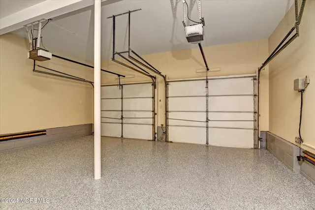 an empty room with white walls