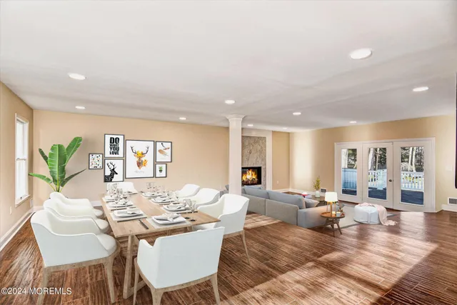 a living room with furniture kitchen view and a table