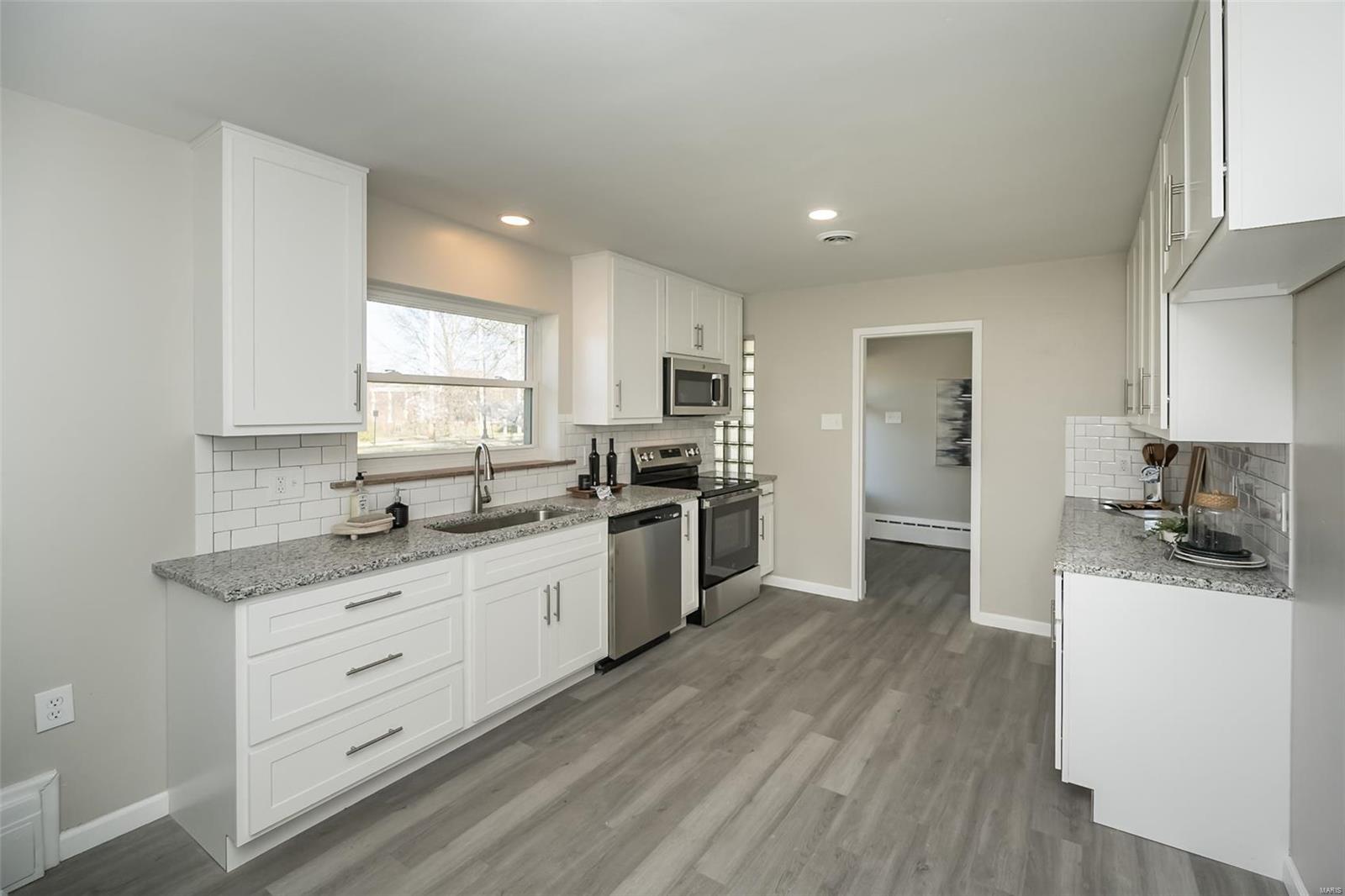 8230 Natural Bridge Road St. Louis, MO 63121 - Photo 7 of 58