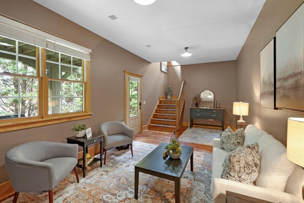 647 Omega Drive Spring City, TN 37381 - Photo 20 of 43 a living room with furniture and a potted plant