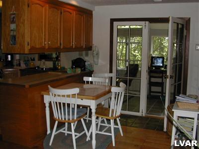 18 Hemlock Road Kunkletown, PA 18058 - Photo 15 of 37 a view of a dining room with furniture and wooden floor