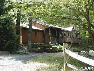 18 Hemlock Road Kunkletown, PA 18058 - Photo 2 of 37 a front view of a house with garden