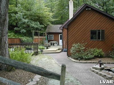 18 Hemlock Road Kunkletown, PA 18058 - Photo 23 of 37 a front view of a house with garden