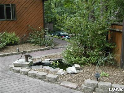18 Hemlock Road Kunkletown, PA 18058 - Photo 29 of 37 a view of a chair and fire pit with potted plants