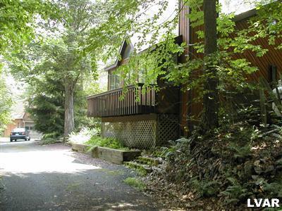 18 Hemlock Road Kunkletown, PA 18058 - Photo 3 of 37 a view of a street with plants and trees