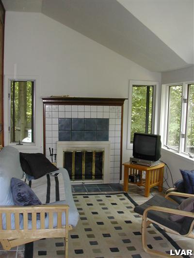 18 Hemlock Road Kunkletown, PA 18058 - Photo 8 of 37 a living room with furniture and a flat screen tv