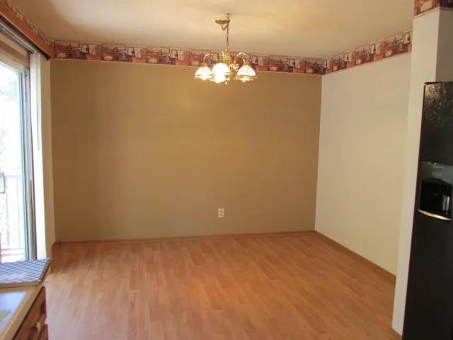 a view of a chandelier in big room
