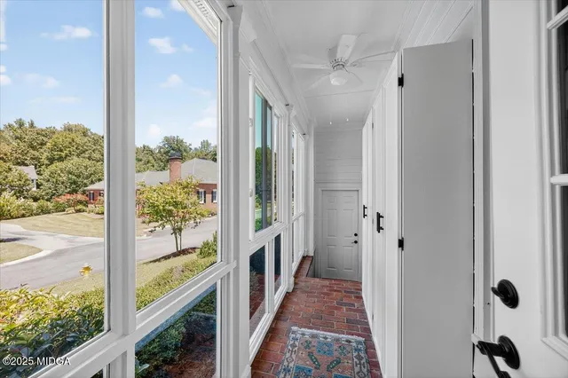 a large kitchen with stainless steel appliances granite countertop a sink stove and refrigerator