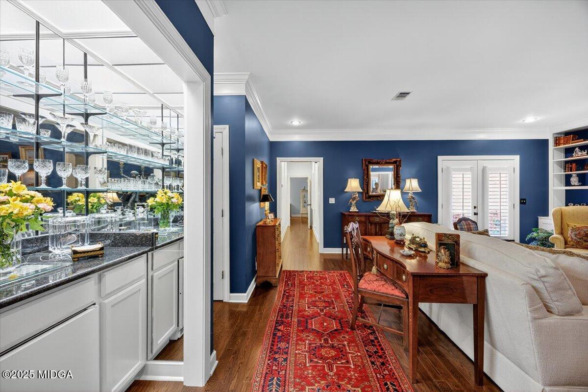 133 Covington Place Macon, GA 31210 - Photo 23 of 36 a living room with stainless steel appliances granite countertop furniture wooden floor and a large window