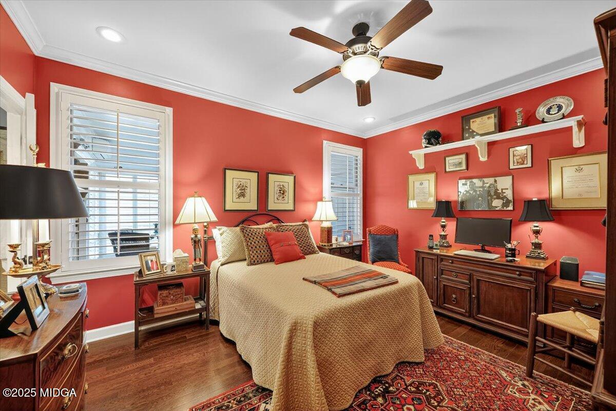 133 Covington Place Macon, GA 31210 - Photo 24 of 36 a bedroom with a bed and wooden floor