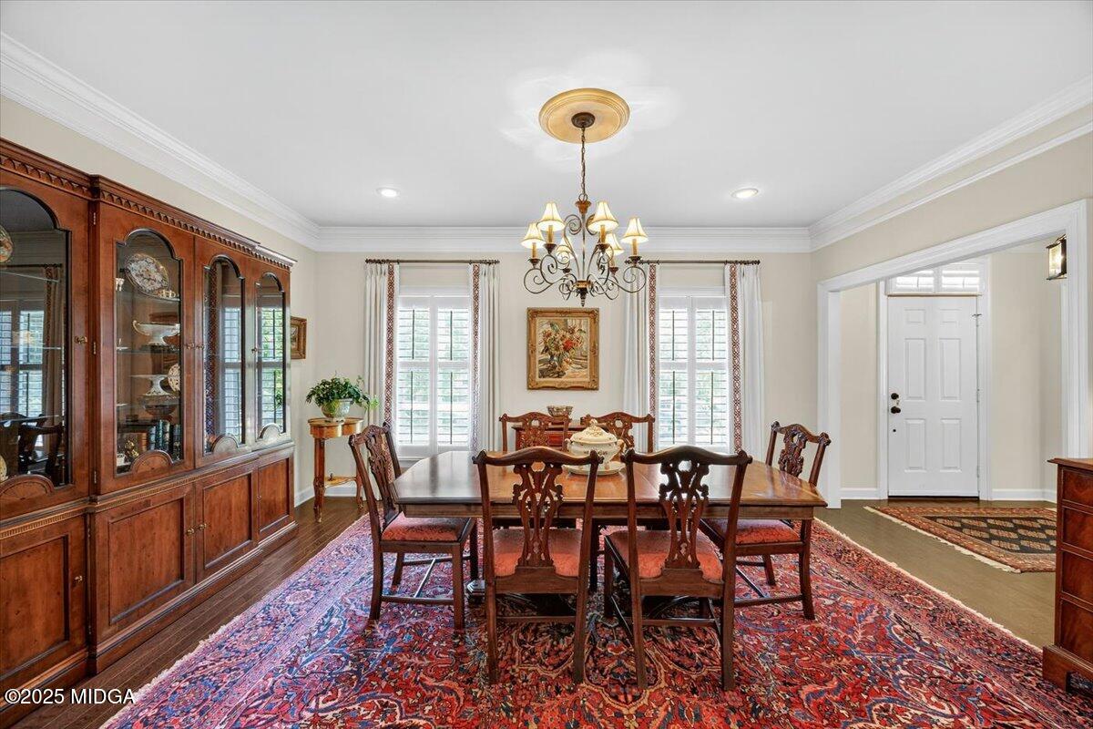 133 Covington Place Macon, GA 31210 - Photo 7 of 36 a view of a dining room with furniture window and wooden floor