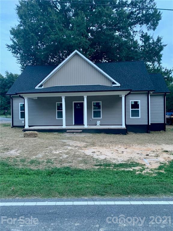 412 Cook Street Kannapolis, NC 28083 - Photo 1 of 1 a front view of a house with a garden