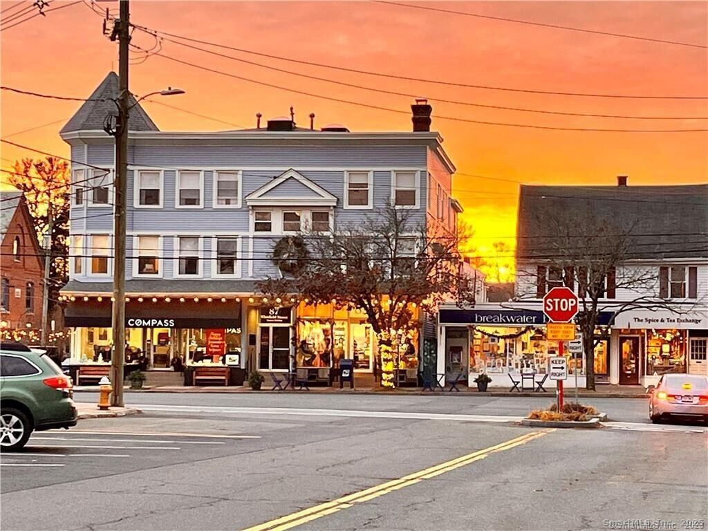 a view of a street with a building and a street light