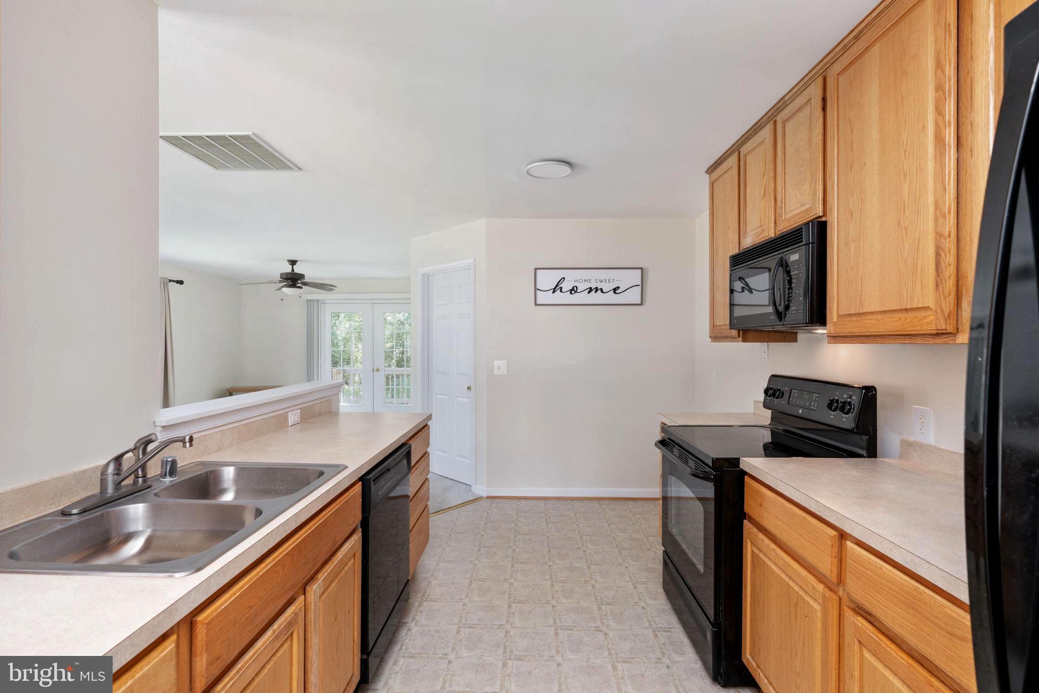 238 12th Street Colonial Beach, VA 22443 - Photo 9 of 32 Kitchen with Space for Added Storage