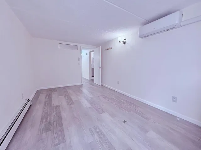 a view of room with hardwood floor