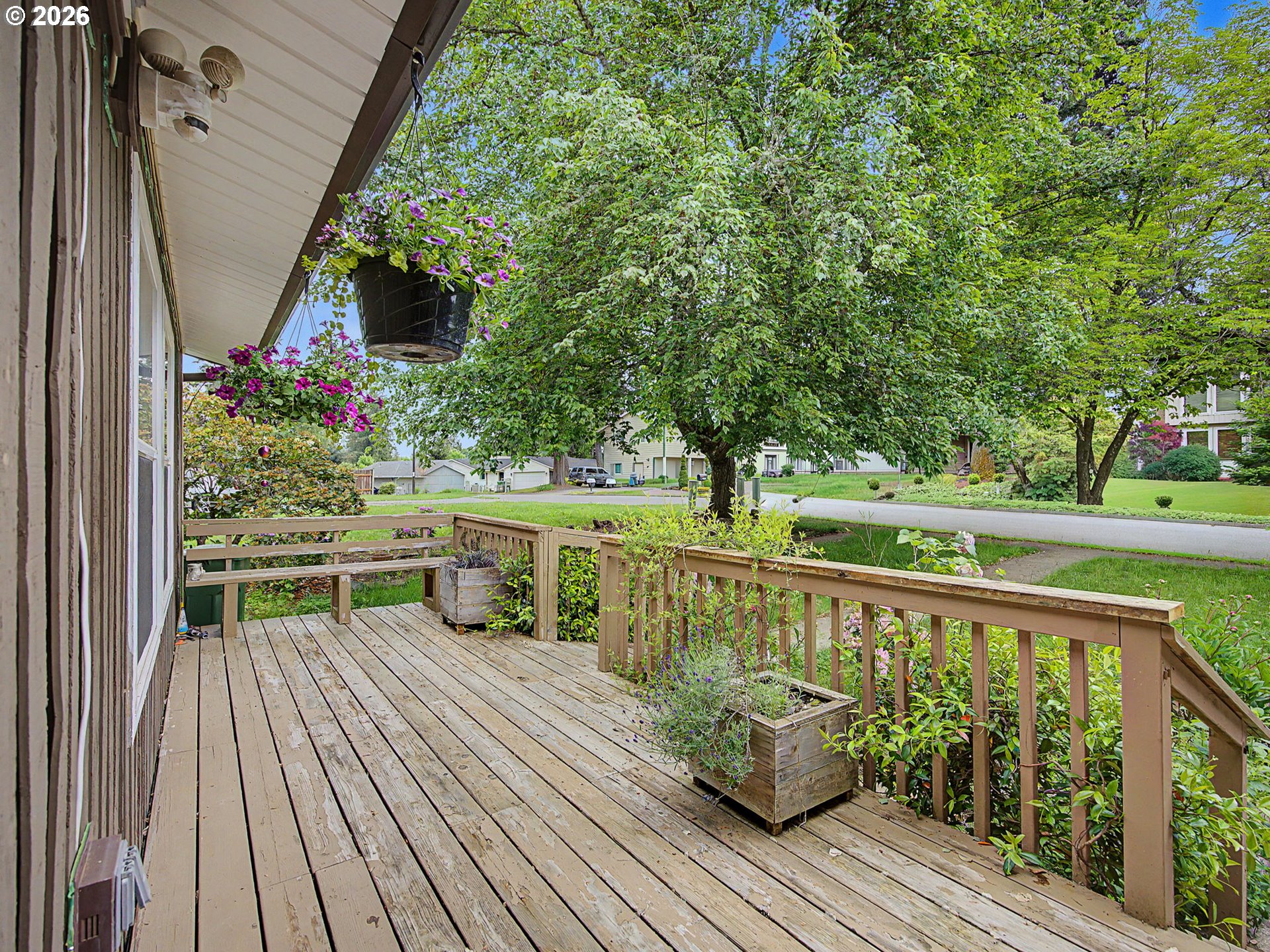 18015 Davis Street Sandy, OR 97055 - Photo 3 of 40 a view of balcony with wooden floor and seating space