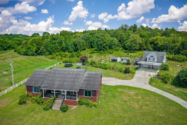 a view of an outdoor space and tennis court