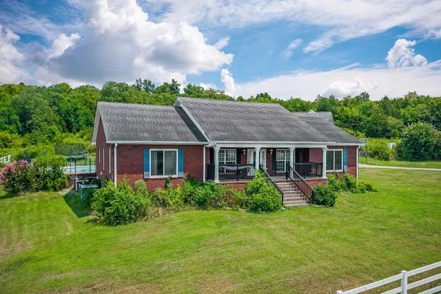 a view of a house with garden